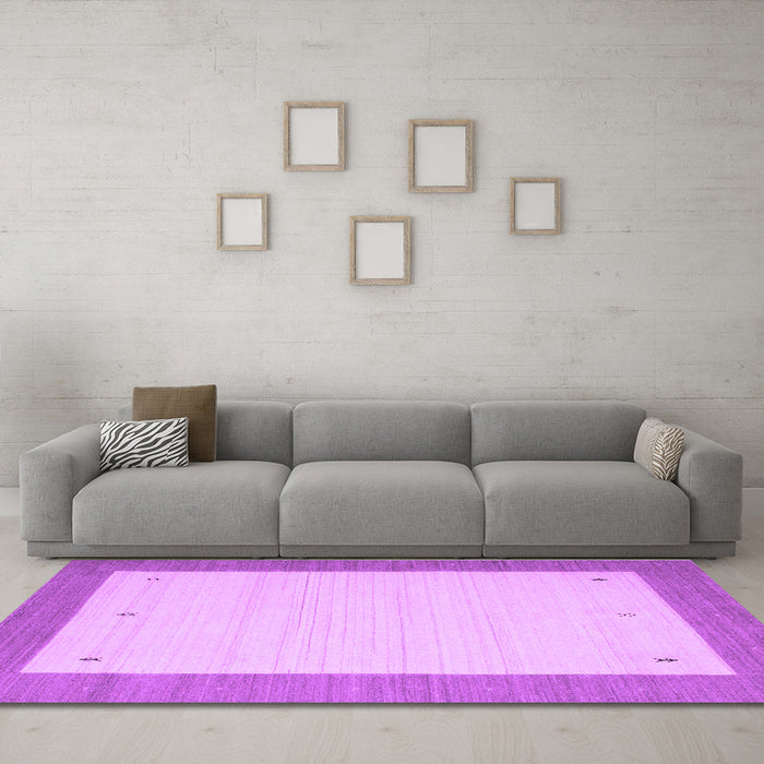 Machine Washable Solid Purple Modern Area Rugs in a Living Room, wshcon569pur