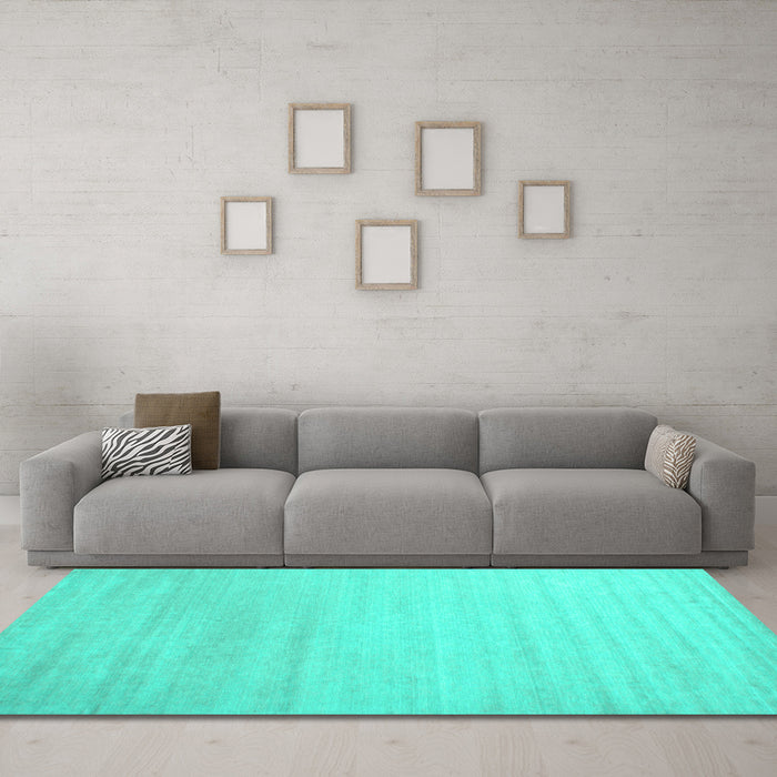 Machine Washable Solid Turquoise Modern Area Rugs in a Living Room,, wshcon577turq