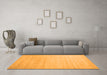 Machine Washable Solid Orange Modern Area Rugs in a Living Room, wshcon577org