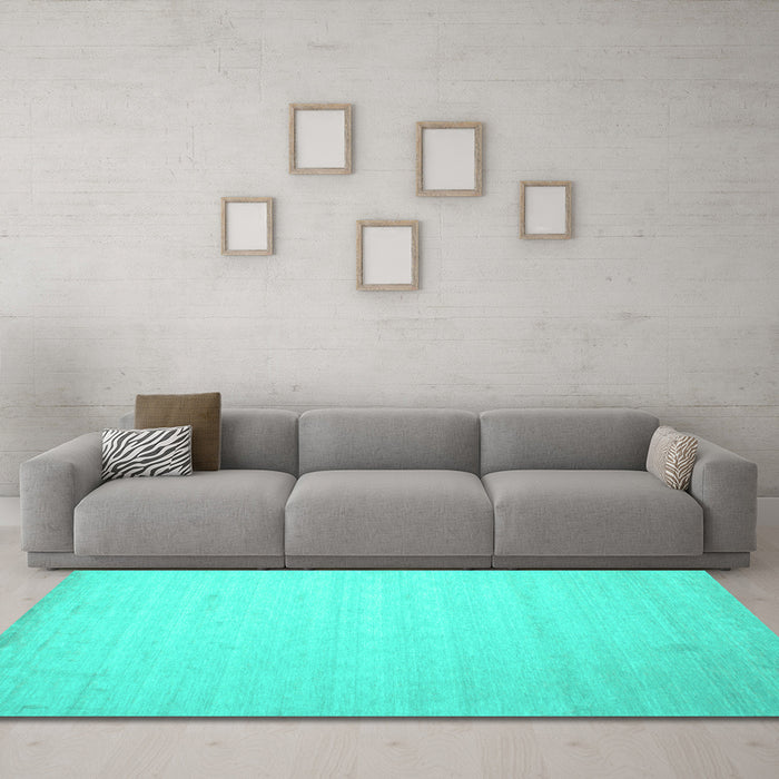 Machine Washable Solid Turquoise Modern Area Rugs in a Living Room,, wshcon579turq