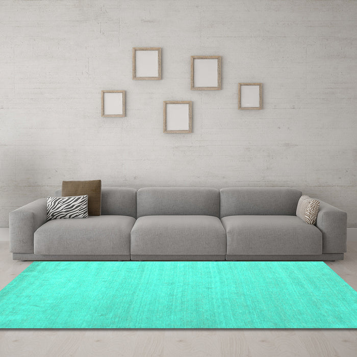 Machine Washable Solid Turquoise Modern Area Rugs in a Living Room,, wshcon580turq