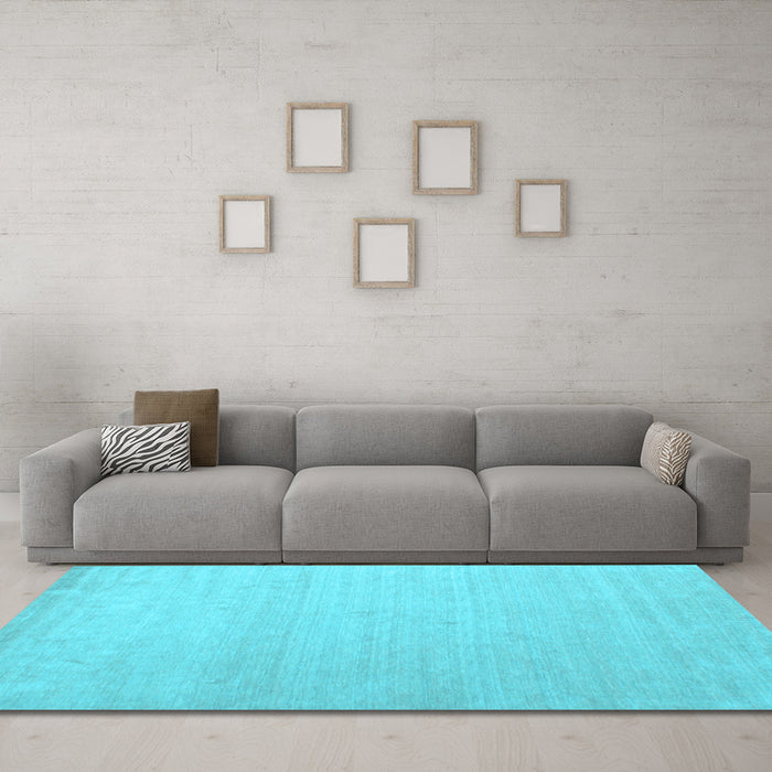 Machine Washable Solid Light Blue Modern Rug in a Living Room, wshcon580lblu