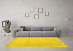 Machine Washable Solid Yellow Modern Rug in a Living Room, wshcon580yw