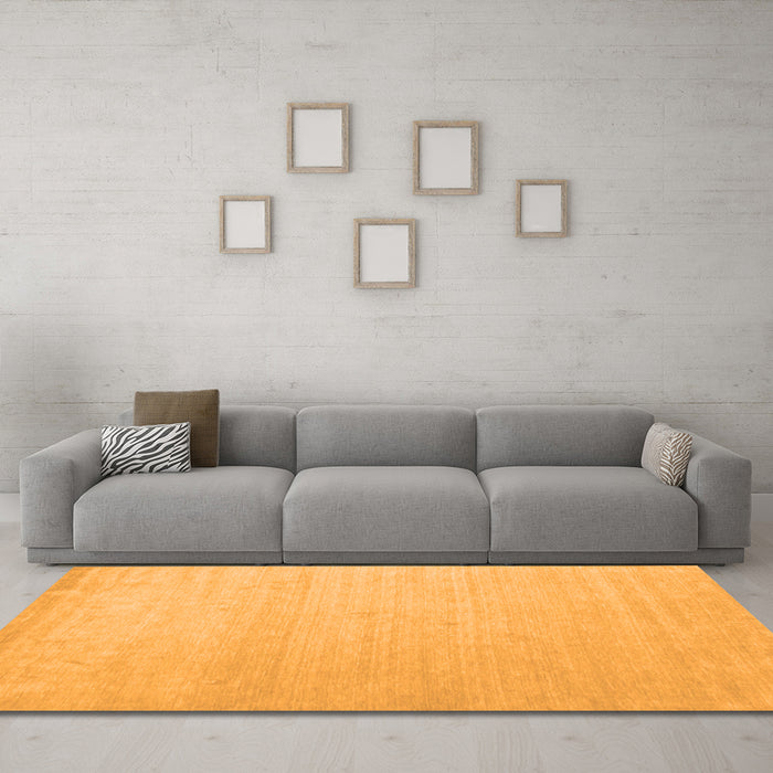 Machine Washable Solid Orange Modern Area Rugs in a Living Room, wshcon580org