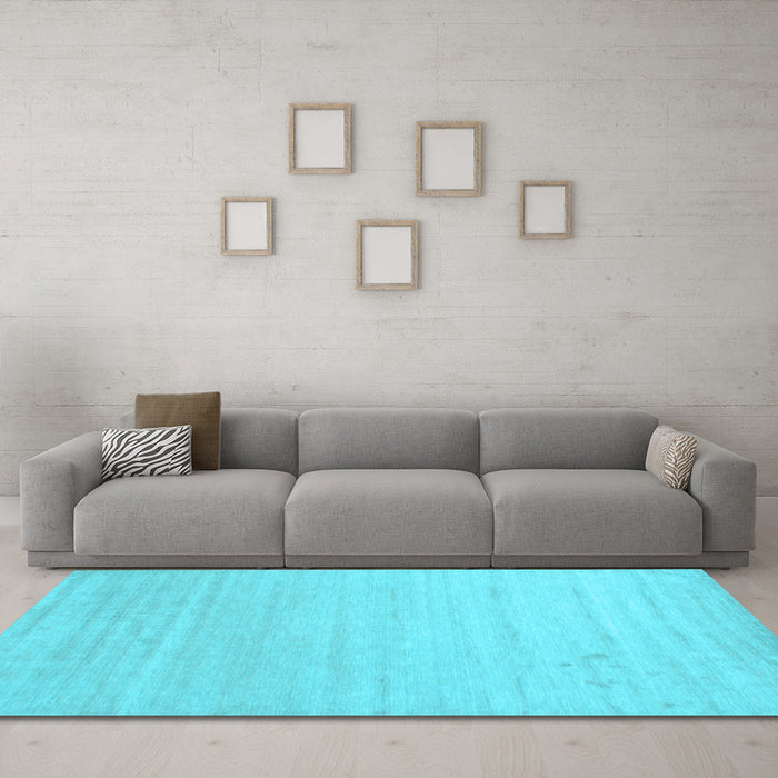 Machine Washable Solid Light Blue Modern Rug in a Living Room, wshcon582lblu