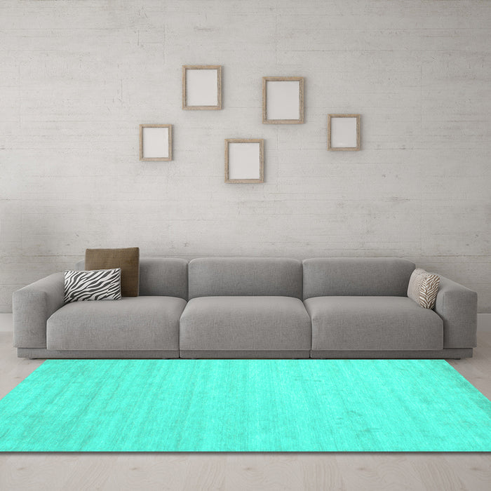 Machine Washable Solid Turquoise Modern Area Rugs in a Living Room,, wshcon583turq
