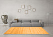 Machine Washable Solid Orange Modern Area Rugs in a Living Room, wshcon585org