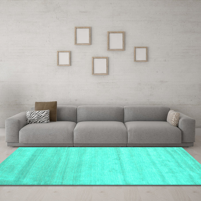 Machine Washable Solid Turquoise Modern Area Rugs in a Living Room,, wshcon585turq