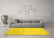 Machine Washable Solid Yellow Modern Rug in a Living Room, wshcon585yw
