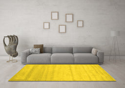 Machine Washable Solid Yellow Modern Rug in a Living Room, wshcon585yw