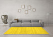 Machine Washable Solid Yellow Modern Rug in a Living Room, wshcon586yw