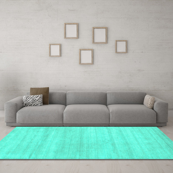 Machine Washable Solid Turquoise Modern Area Rugs in a Living Room,, wshcon586turq