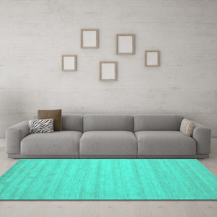 Machine Washable Solid Turquoise Modern Area Rugs in a Living Room,, wshcon587turq
