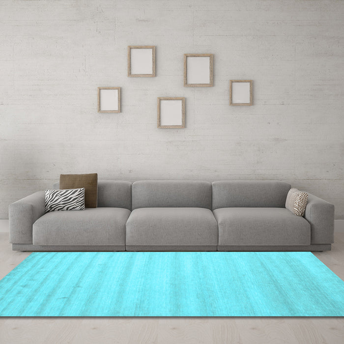 Machine Washable Solid Light Blue Modern Rug in a Living Room, wshcon590lblu
