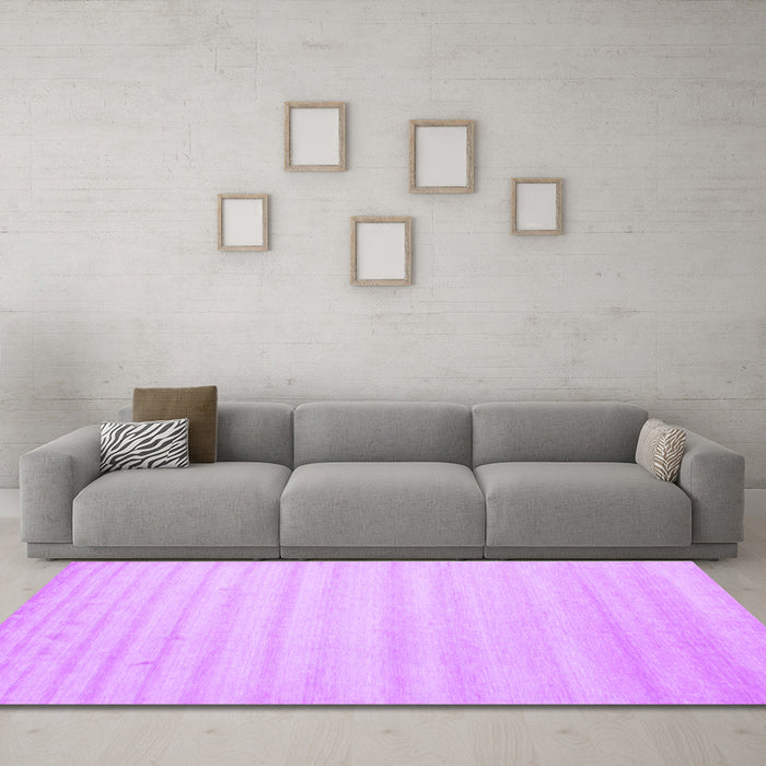 Machine Washable Solid Purple Modern Area Rugs in a Living Room, wshcon590pur