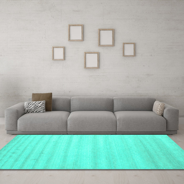 Machine Washable Solid Turquoise Modern Area Rugs in a Living Room,, wshcon590turq