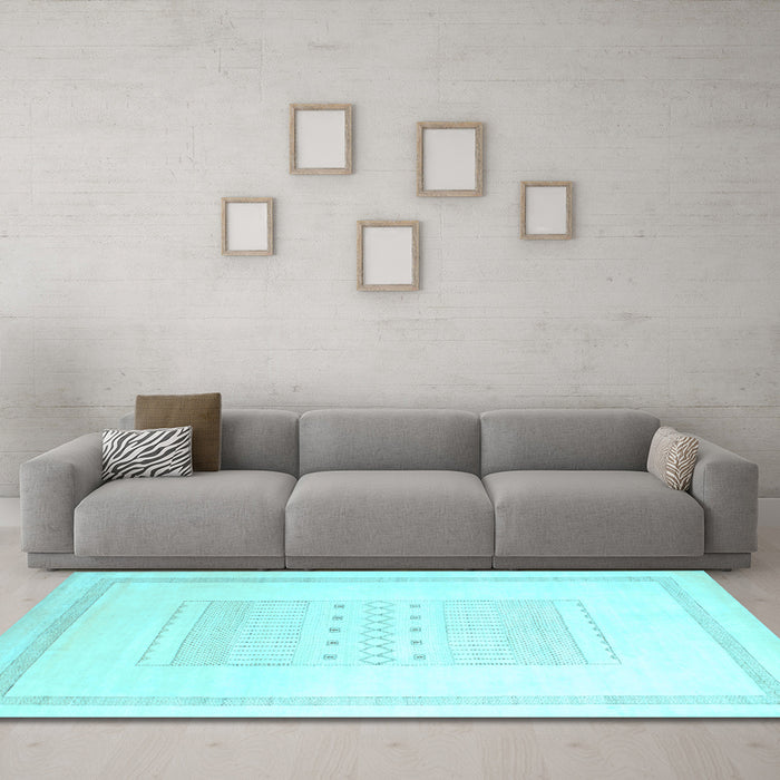 Machine Washable Solid Light Blue Modern Rug in a Living Room, wshcon603lblu