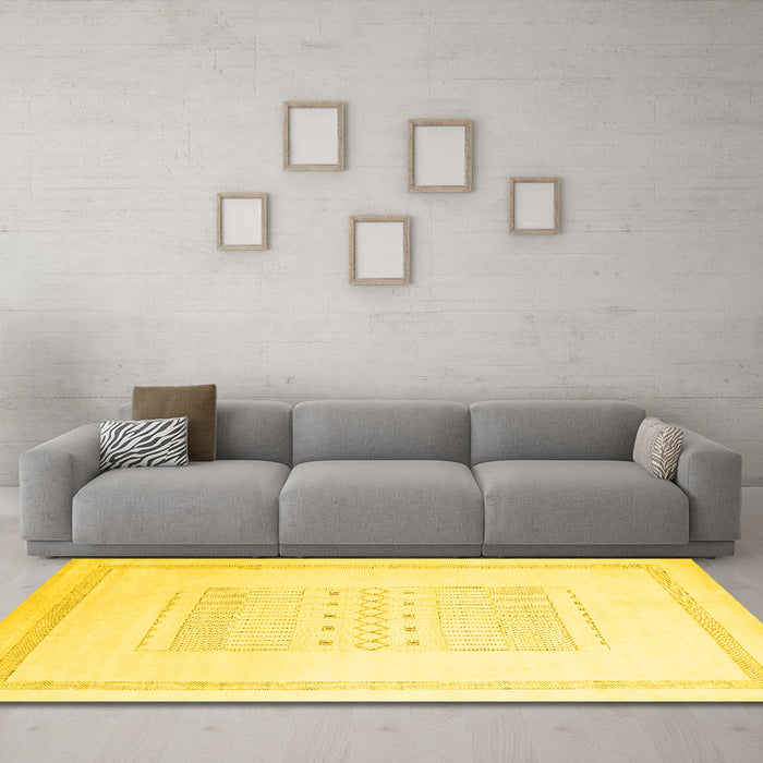 Machine Washable Solid Yellow Modern Rug in a Living Room, wshcon603yw
