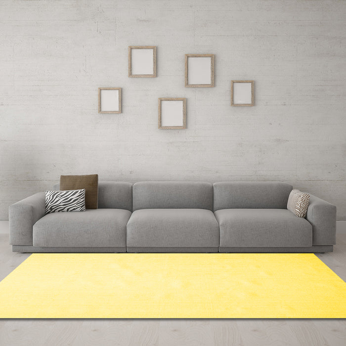 Machine Washable Solid Yellow Modern Rug in a Living Room, wshcon623yw