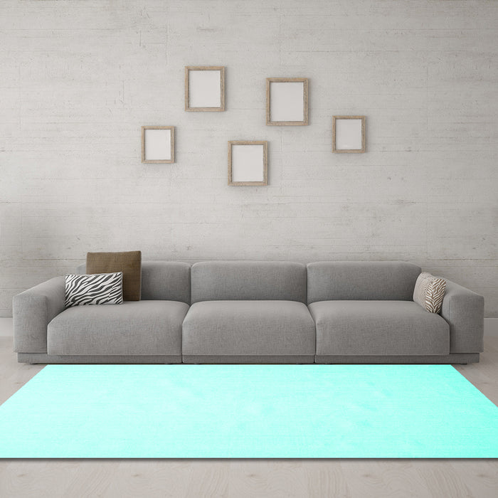 Machine Washable Solid Turquoise Modern Area Rugs in a Living Room,, wshcon623turq