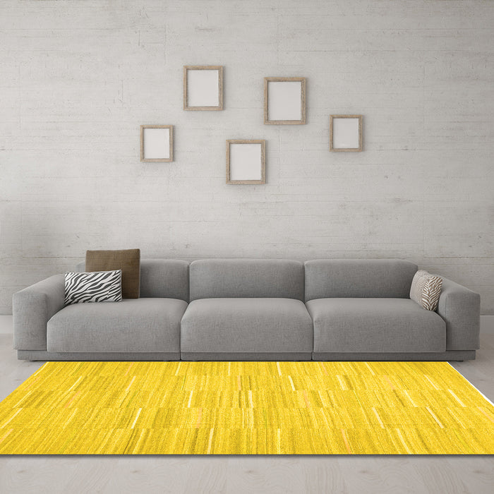 Machine Washable Solid Yellow Modern Rug in a Living Room, wshcon626yw