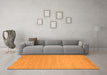 Machine Washable Solid Orange Modern Area Rugs in a Living Room, wshcon62org