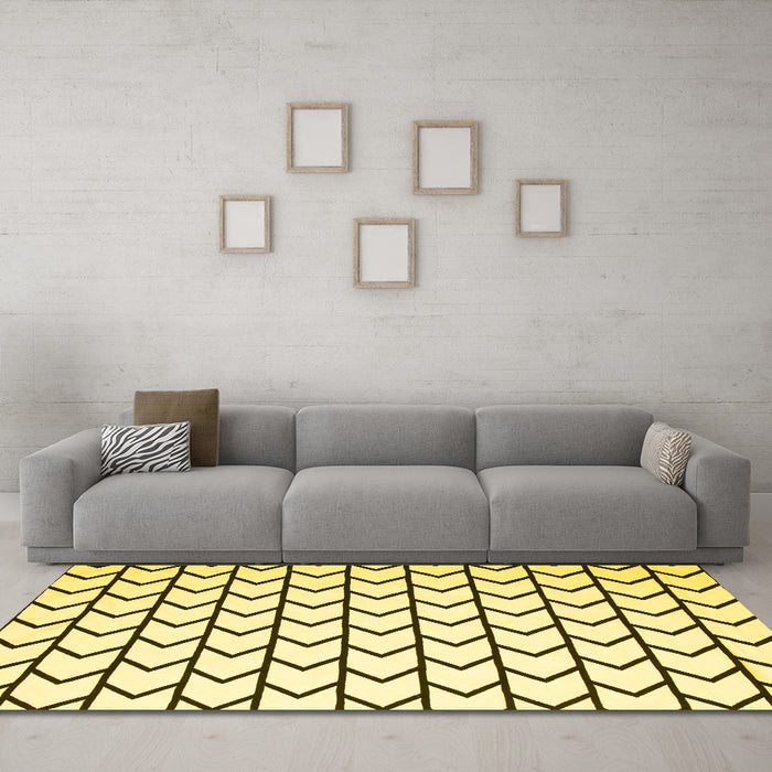 Machine Washable Solid Yellow Modern Rug in a Living Room, wshcon637yw