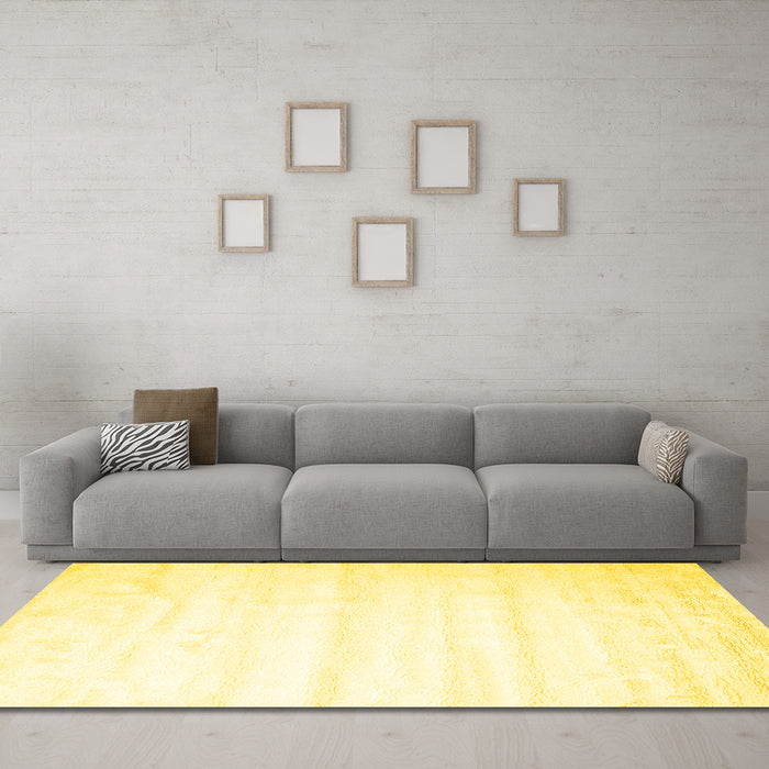 Machine Washable Solid Yellow Modern Rug in a Living Room, wshcon644yw