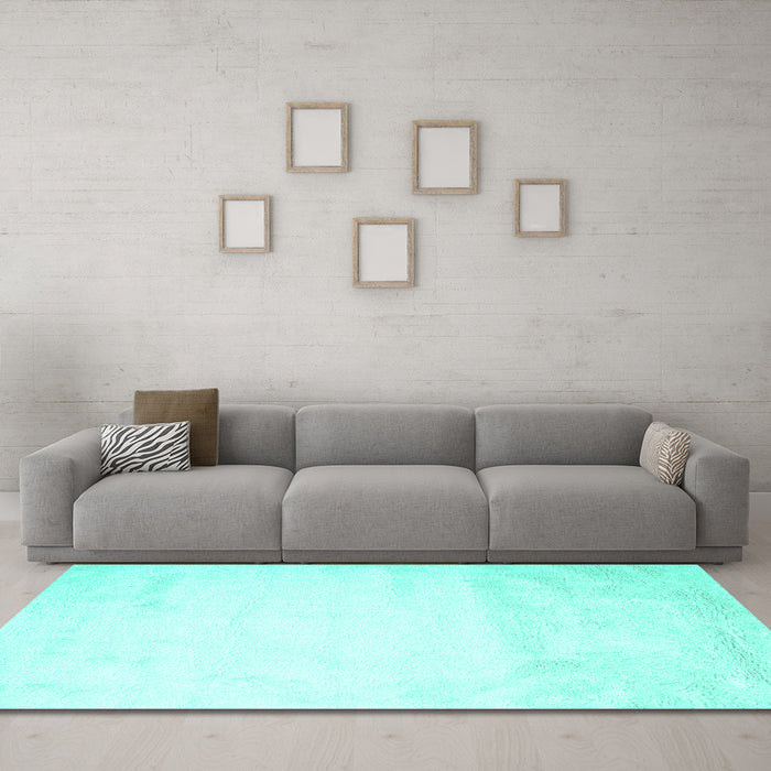 Machine Washable Solid Turquoise Modern Area Rugs in a Living Room,, wshcon651turq