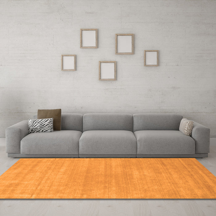Machine Washable Solid Orange Modern Area Rugs in a Living Room, wshcon65org