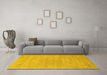 Machine Washable Solid Yellow Modern Rug in a Living Room, wshcon65yw