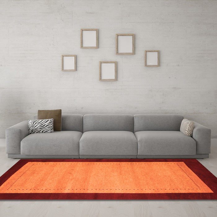 Machine Washable Abstract Orange Contemporary Area Rugs in a Living Room, wshcon661org