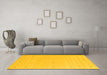 Machine Washable Solid Yellow Modern Rug in a Living Room, wshcon662yw