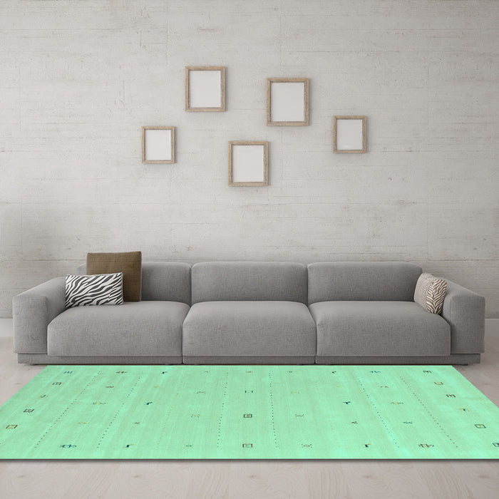 Machine Washable Solid Turquoise Modern Area Rugs in a Living Room,, wshcon662turq