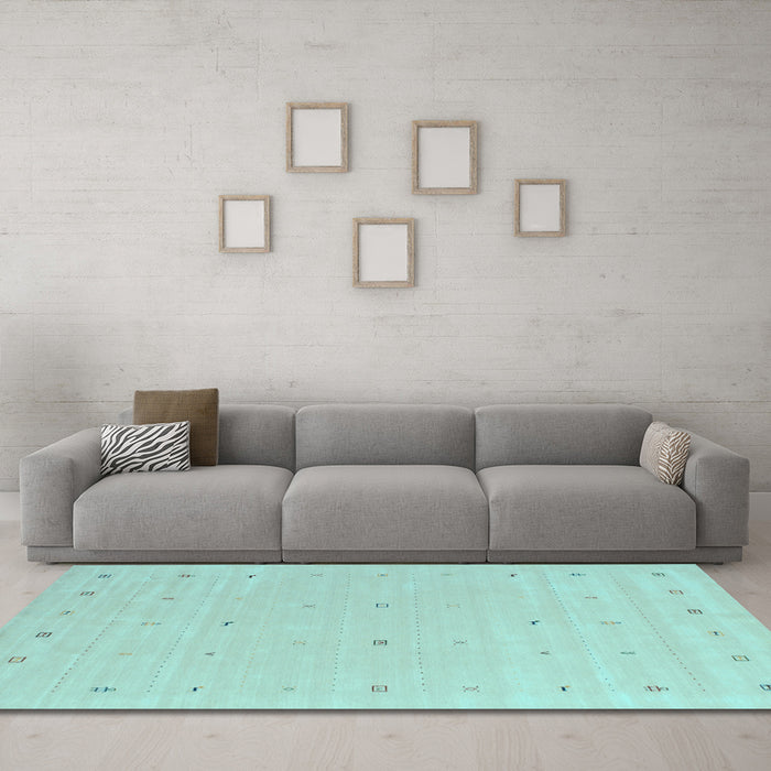 Machine Washable Solid Light Blue Modern Rug in a Living Room, wshcon662lblu
