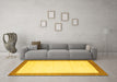 Machine Washable Solid Yellow Modern Rug in a Living Room, wshcon664yw