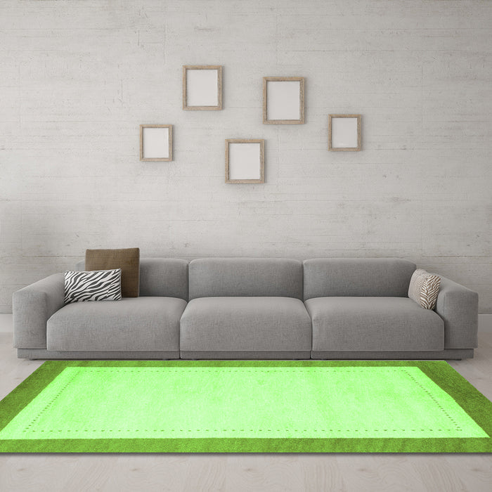 Machine Washable Solid Green Modern Area Rugs in a Living Room,, wshcon664grn