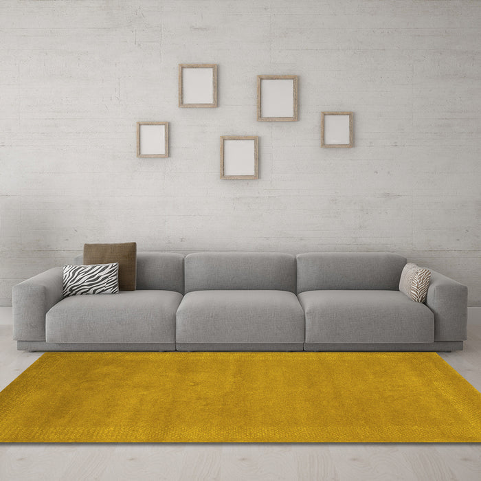 Machine Washable Abstract Yellow Contemporary Rug in a Living Room, wshcon665yw