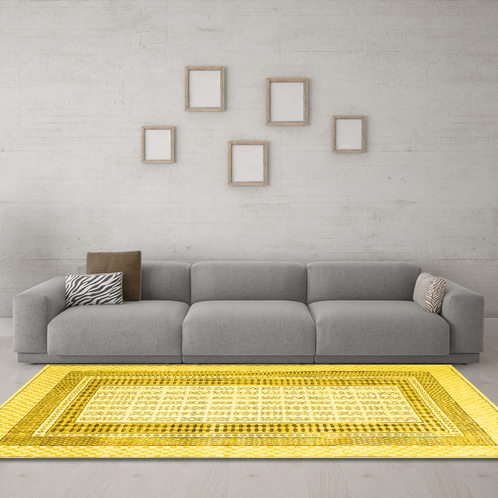 Machine Washable Abstract Yellow Contemporary Rug in a Living Room, wshcon670yw