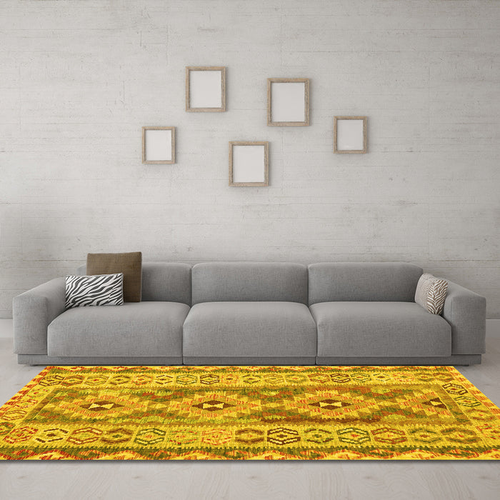 Machine Washable Southwestern Yellow Country Rug in a Living Room, wshcon675yw