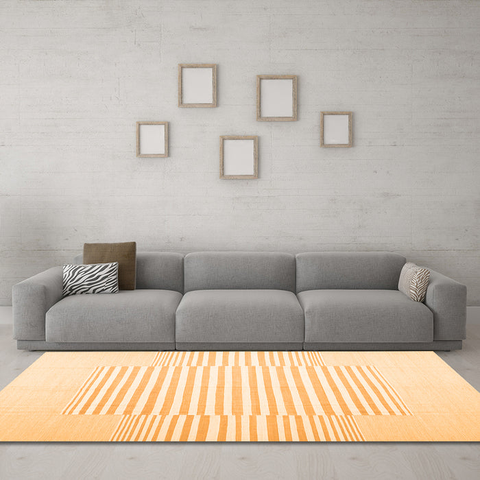 Machine Washable Solid Orange Modern Area Rugs in a Living Room, wshcon677org