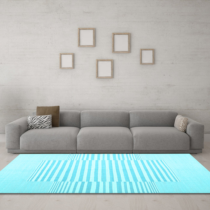 Machine Washable Solid Light Blue Modern Rug in a Living Room, wshcon677lblu