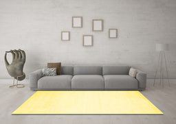 Machine Washable Solid Yellow Modern Rug in a Living Room, wshcon68yw