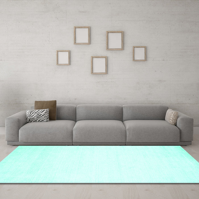 Machine Washable Solid Turquoise Modern Area Rugs in a Living Room,, wshcon68turq