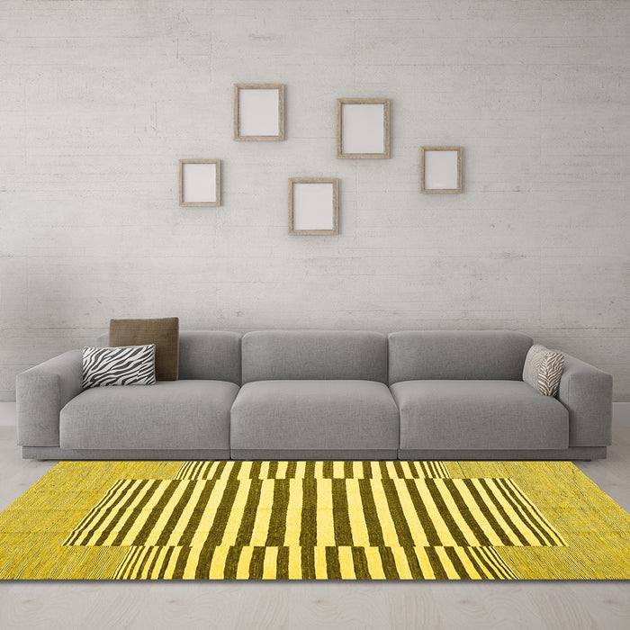 Machine Washable Solid Yellow Modern Rug in a Living Room, wshcon691yw