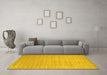 Machine Washable Solid Yellow Modern Rug in a Living Room, wshcon70yw