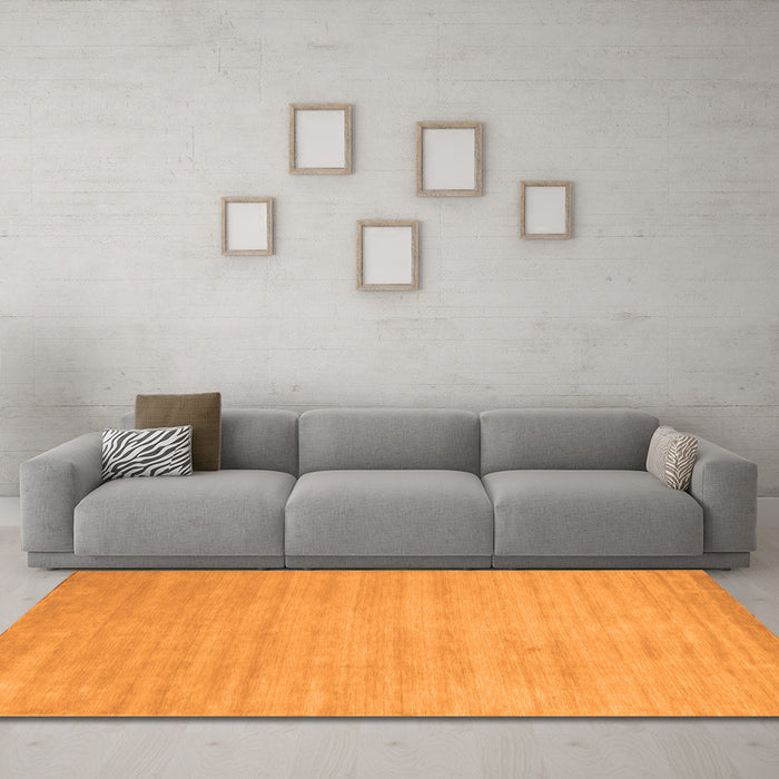 Machine Washable Solid Orange Modern Area Rugs in a Living Room, wshcon70org