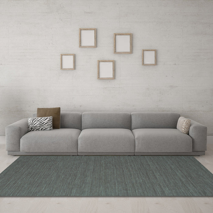 Machine Washable Abstract Turquoise Contemporary Area Rugs in a Living Room,, wshcon716turq