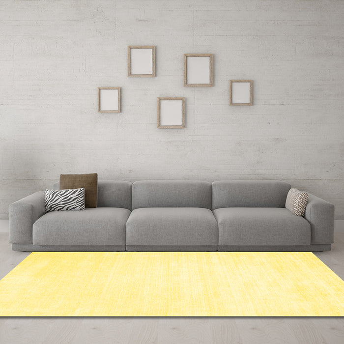 Machine Washable Solid Yellow Modern Rug in a Living Room, wshcon71yw