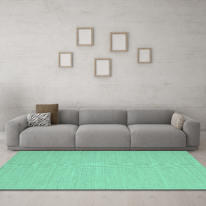 Machine Washable Solid Turquoise Modern Area Rugs in a Living Room,, wshcon724turq